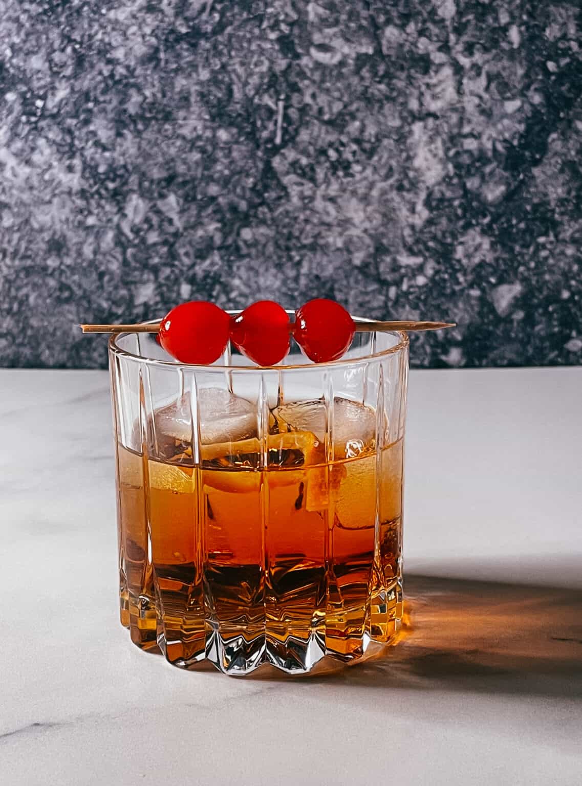 Cocktail Amaretto Old Fashioned, with bourbon and maple Urbaine City