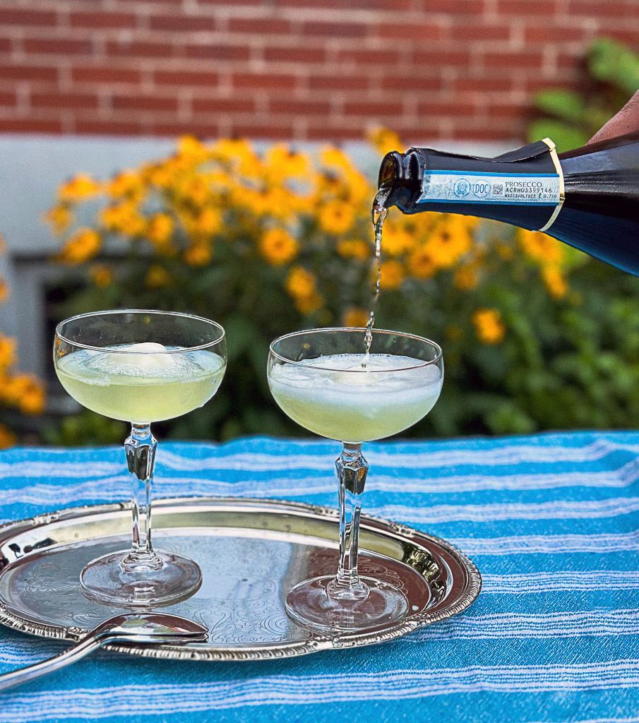 Topping the sgroppino with prosecco